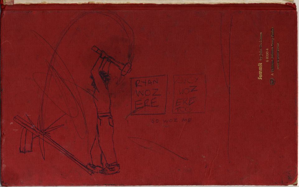 Back cover of the red Trentham Pit Camp Diary laid horizontally. On the left, a hand-drawn sketch shows a miner holding a pickaxe. To the right, several hand-drawn boxes contain handwritten messages: “Ryan woz ere”, “Lucy woz ere too”, and below them, “So woz me”.